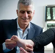 Specialist examining a patient's hand and wrist